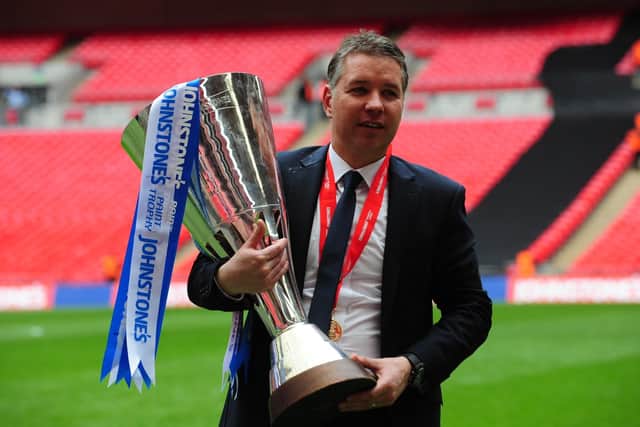 Posh manager Darren Ferguson with the Johnstone's Paint Trophy at Wembley in 2014.
