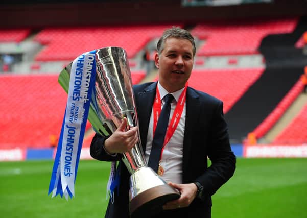 Posh manager Darren Ferguson with the Johnstone's Paint Trophy at Wembley in 2014.