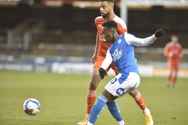 Siriki Dembele in action for Posh against Blackpool. Photo: David Lowndes.