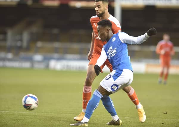 Siriki Dembele in action for Posh against Blackpool. Photo: David Lowndes.