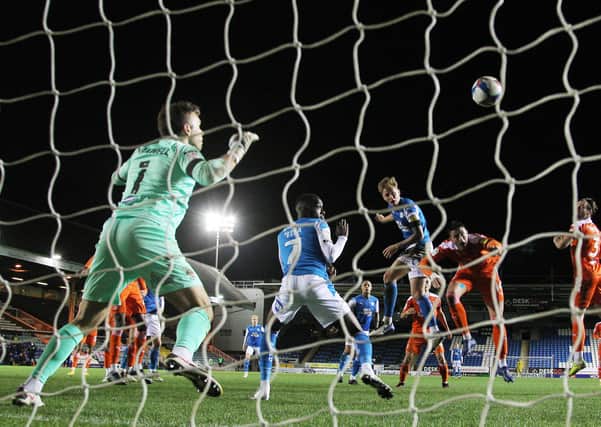 Frankie Kent of Peterborough United scores his sides equalising goal against Blackpool. Photo: Joe Dent/theposh.com.