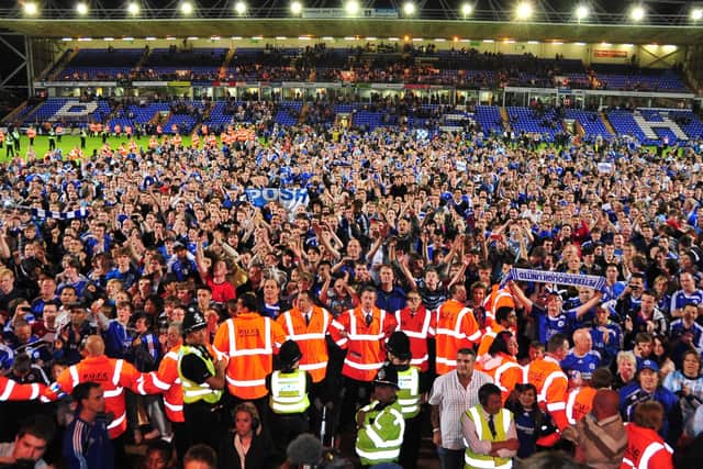 Posh fans in celebratory mood.