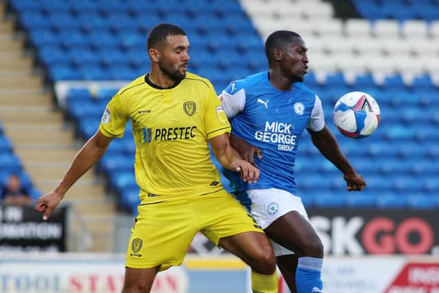 Idris Kanu (right) could play for Posh against Plymouth.