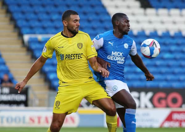 Idris Kanu (right) could play for Posh against Plymouth.