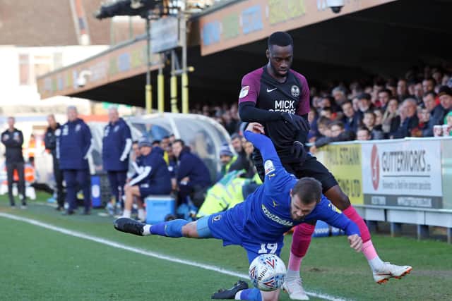 Mo Eisa in action for Posh at Wimbledon.