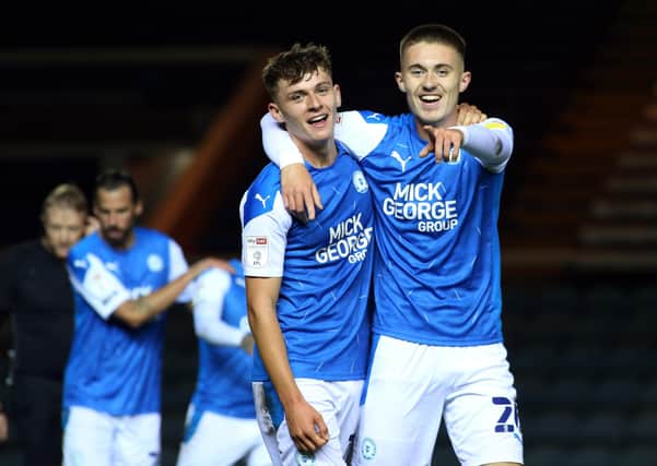 Flynn Clarke (right) and Harrison Burrows could be in the Posh squad to face Chorley.
