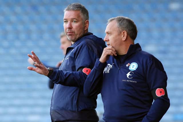 Posh boss Darren Ferguson(left) with assistant manager Mark Robson.
