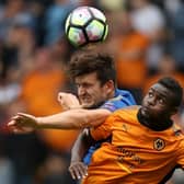 Leicester City's Harry Maguire (left) battles for the ball with Wolverhampton Wanderers' Bright Enobakhare. Photo: Martin Ricketts PA wire.