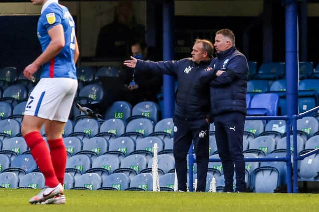 Posh manager Darren Ferguson and his assistant Manager Mark Robson watch on from the touchline against Portsmouth. Photo: Joe Dent/theposh.com.