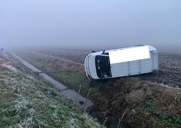Overturned van on Black Drove this morning (Picture: Policing Fenland)