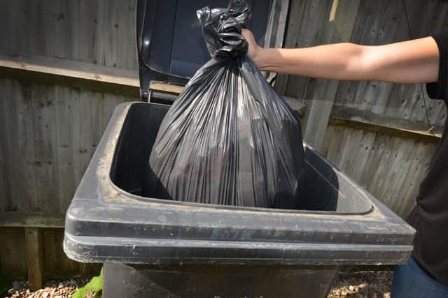 Collections of black bin rubbish have been prioritised over green bins due to staff absences