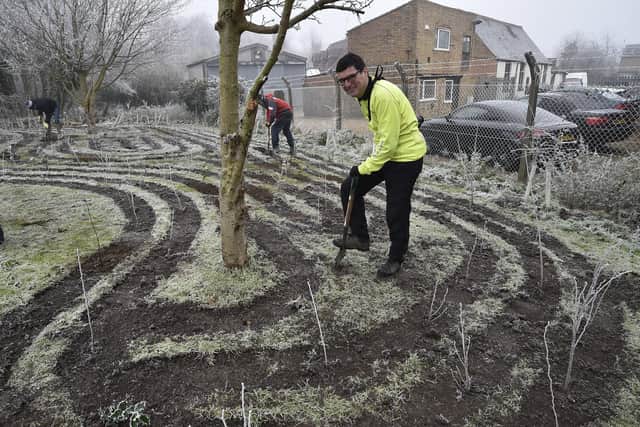 Volunteers planting a 'Tiny Forest' at Nene Valley Community Centre, Candy Street, Woodston
