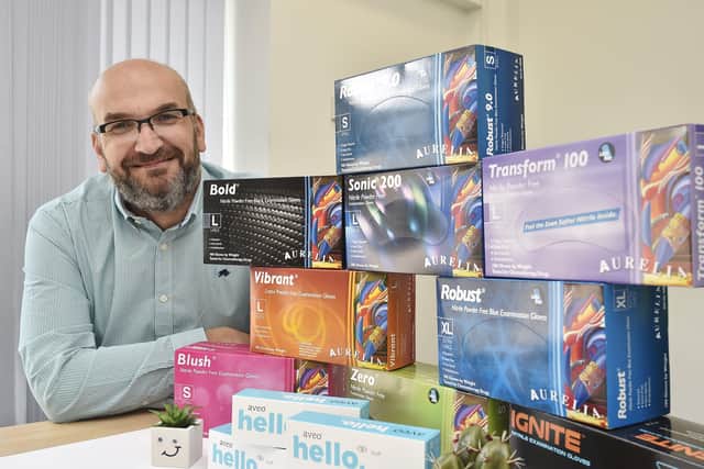 Supermax Healthcare  MD  Iain Crawford at the  Fengate premises with some of their products EMN-190820-175728009
