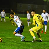 Josh Moreman tracks AFC Rushden & Diamonds' Luke Fairlamb during Peterborough Sports' big 5-1 success in the FA Trophy on Tuesday night. Picture courtesy of Hawkins Images Photography