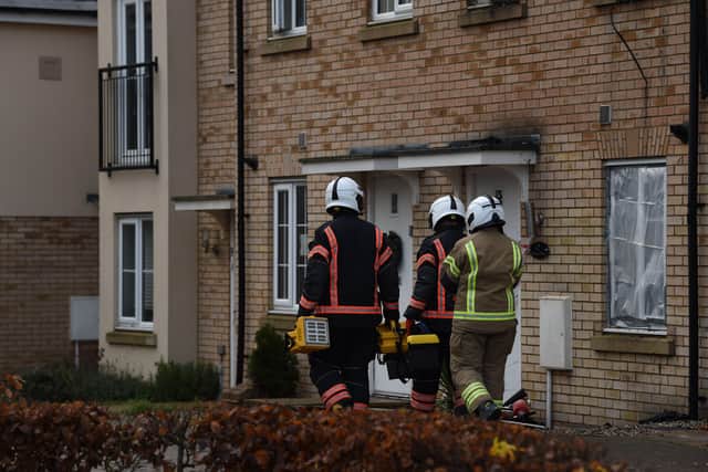 Emergency services at the scene of a house fire on Buttercup Avenue, Eynesbury, Cambridgeshire, in which a three-year-old boy and a seven-year-old girl died. Picture: Press Association.
