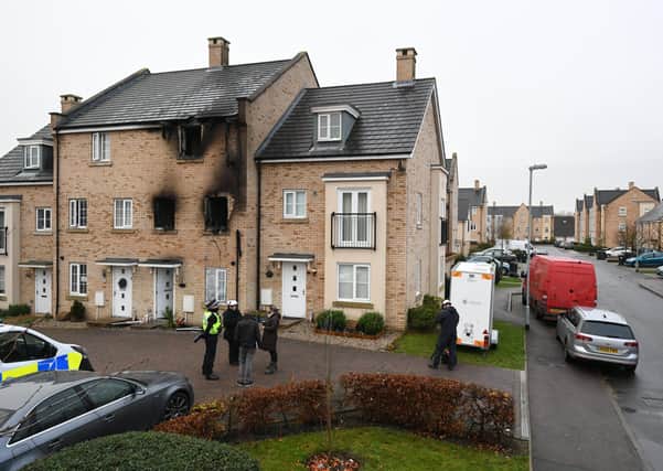 Emergency services at the scene of a house fire on Buttercup Avenue, Eynesbury, Cambridgeshire, in which a three-year-old boy and a seven-year-old girl died. Picture: Press Association.