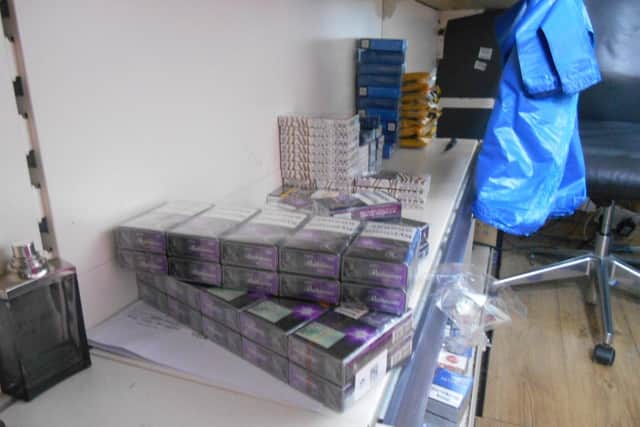 Trading Standards officers seized illicit cigarettes and tobacco at the shop.