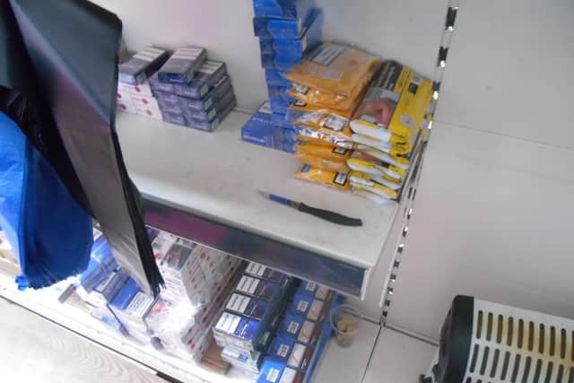Trading Standards officers seized illicit cigarettes and tobacco at the shop.