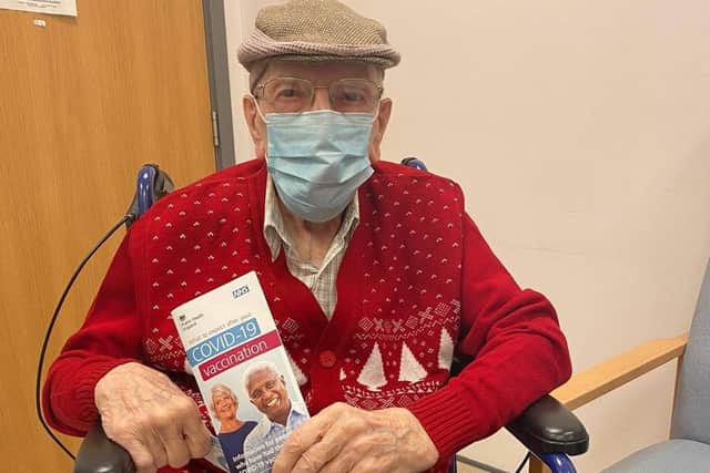 Jim Truman, 95, is one of the first to receive the vaccine.