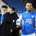 Jonson Clarke-Harris of Peterborough United with the match ball at full-time after scoring a hat-trick against Rochdale. Photo: Joe Dent/theposh.com.