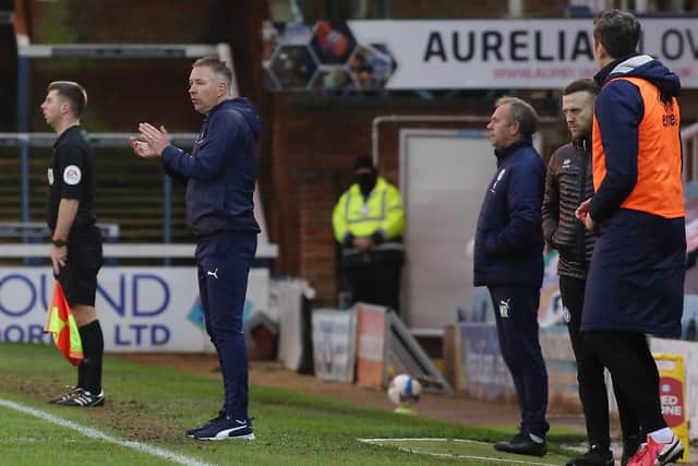 Posh boss Darren Ferguson applauds his players during the 4-1 win over Rochdale.