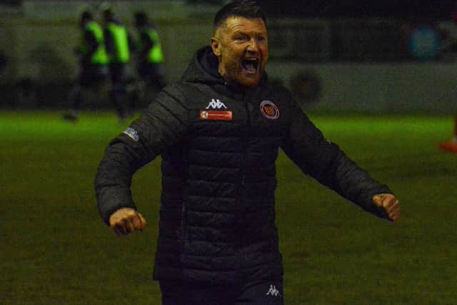 Stamford manager Graham Drury celebrates victory over Kidderminster in the FA Trophy. Photo: Dan Allen.