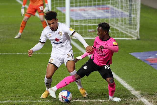 Siriki Dembele in action for Posh against MK Dons. Photo: Joe Dent/theposh.com.