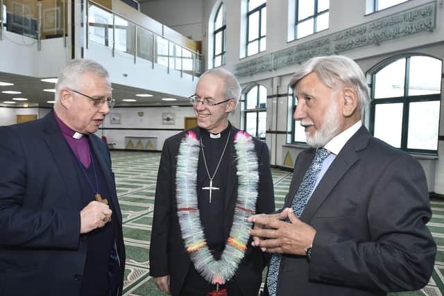 Archbishop of Cantebury Justin Welby visiting Peterborough  at Faizan-e-Madina mosque with the Bishop of Peterborough  Rt Revd Donald Allister meeting mosque chairman Abdul Choudhuri.