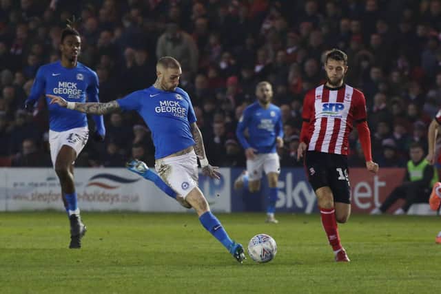 Action from Lincoln v Posh last season.