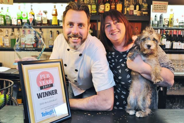Peterborough Telegraph Pub of the Year awards winners  John and Della McGinn, owners of the Dog-in-a-Doublet pub near Whittlesey EMN-171112-152213009