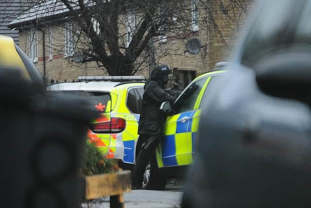 Police incident at Monarch Avenue, off Fletton High Street EMN-201221-085945009