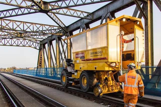 The workers completing the project