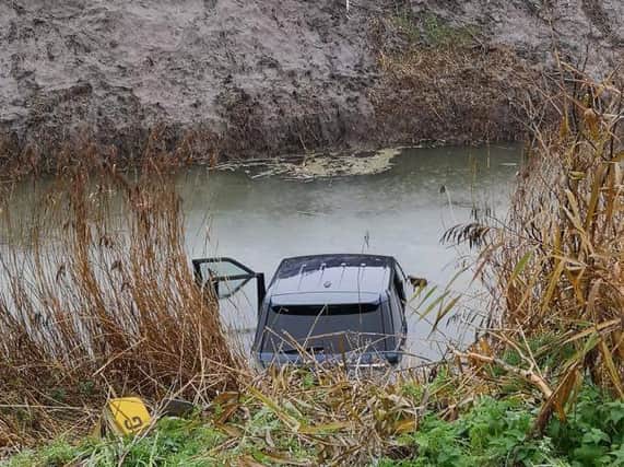 The partially submerged car. Pic: Ben Davis