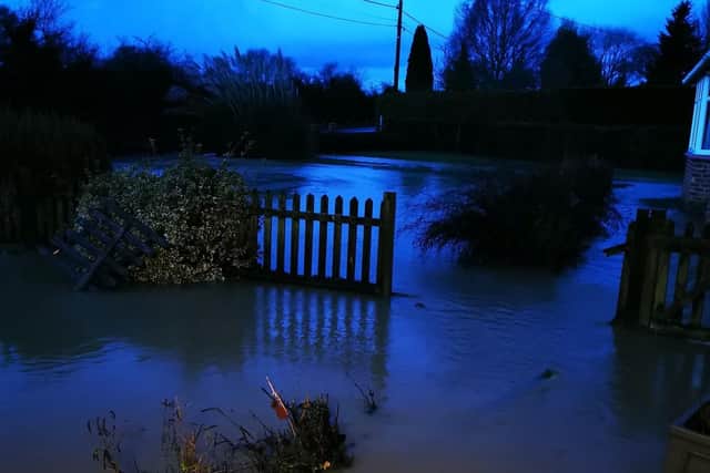Handout photo courtesy of Peter Lloyd of flooding at his home in Peterborough after heavy rain overnight.