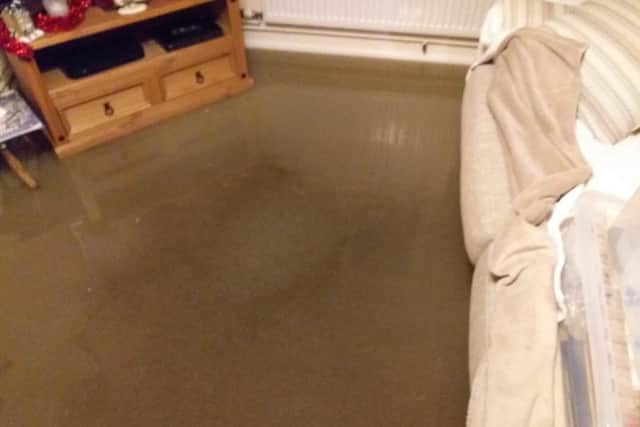 Handout photo courtesy of Peter Lloyd of flooding at his home in Peterborough, Cambridgeshire after heavy rain overnight.
