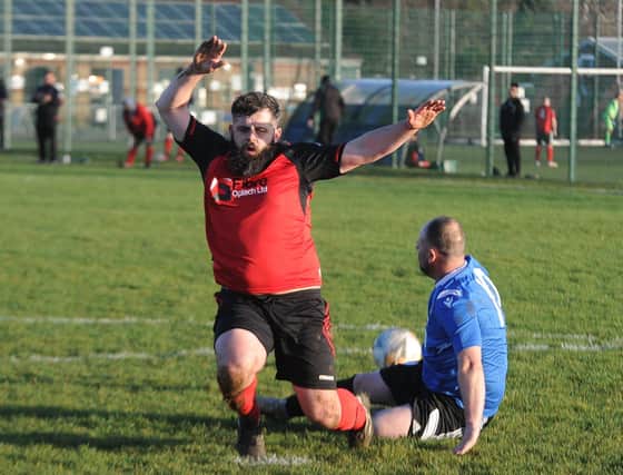 Iszaak Setchfield of Netherton United A takes a tumble in a pre-Xmas PDFL Division Four match against Orton Rangers Reserves. Photo: David Lowndes.