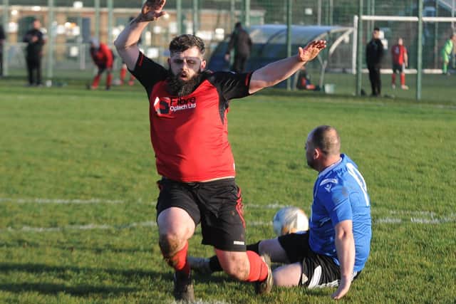 Iszaak Setchfield of Netherton United A takes a tumble in a pre-Xmas PDFL Division Four match against Orton Rangers Reserves. Photo: David Lowndes.