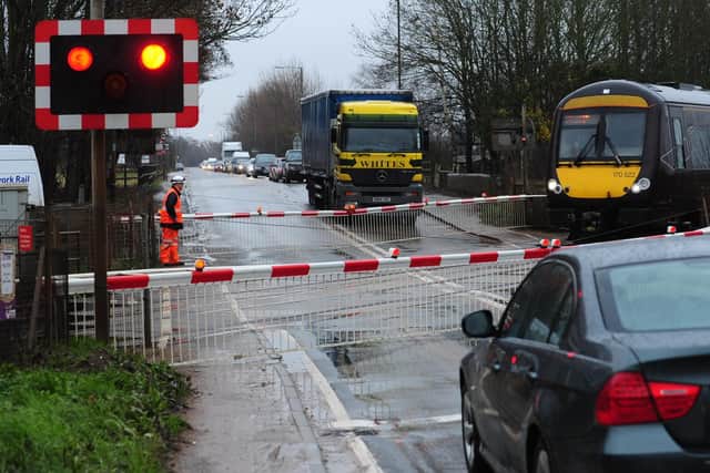 A barrier failure at Kings Dyke level crossing is causing tailbacks on the A605. (archive image).