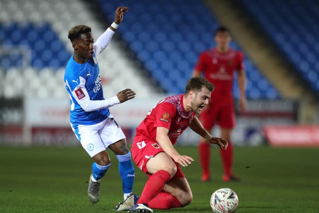 Sirki Dembele in action (left).