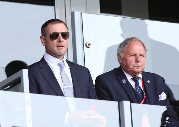 Posh co-owner Darragh MacAnthony (left) and the club's director of football Barry Fry.