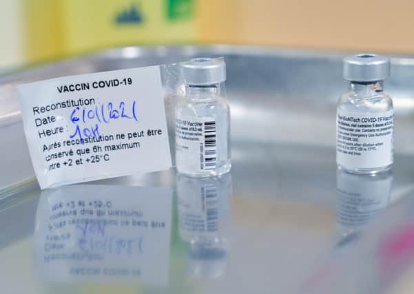 Doses of the Pfizer-BioNTech Covid-19 vaccine. (Photo by Guillaume SOUVANT / AFP) ( via Getty Images).