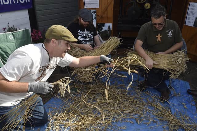 Whittlesey Festival 2019. Whittlesey Straw Bear Society members Graham Booth, Luke Crickwood and Adrian Bull. EMN-190909-082611009
