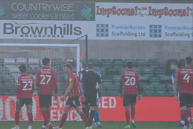 Posh defender Nathan Thompson is sent off by referee Will Finnie at Lincoln. Photo: Joe Dent/theposh.com.