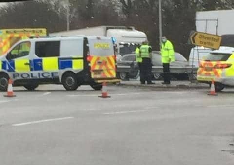 Officers at the scene of the incident at the Eye roundabout. Photo: Ronan Noghtingale.