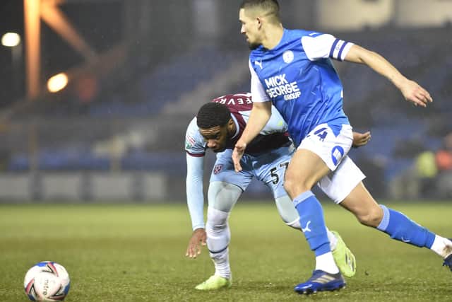 Niall Mason could start for Posh against MK Dons.