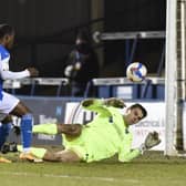 Siriki Dembele scores for Posh against Portsmouth in the Papa John's Trophy. Photo: David Lowndes.