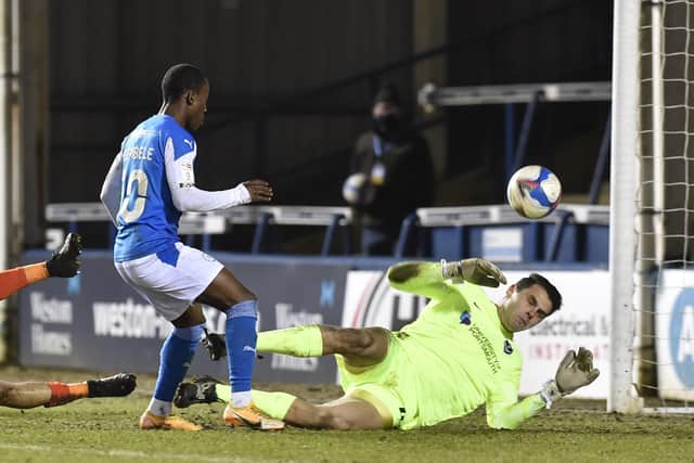 Siriki Dembele scores for Posh against Portsmouth in the Papa John's Trophy. Photo: David Lowndes.