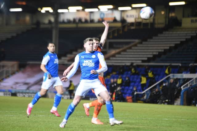 Sammie Szmodics in action for Posh against Portsmouth in the Papa John's Trophy.