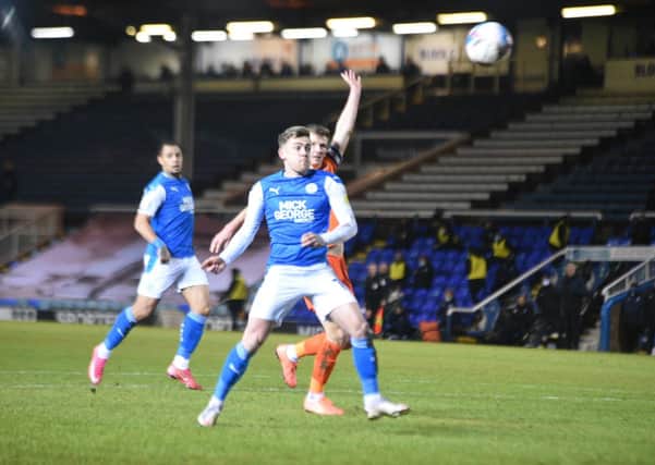 Sammie Szmodics in action for Posh against Portsmouth in the Papa John's Trophy.