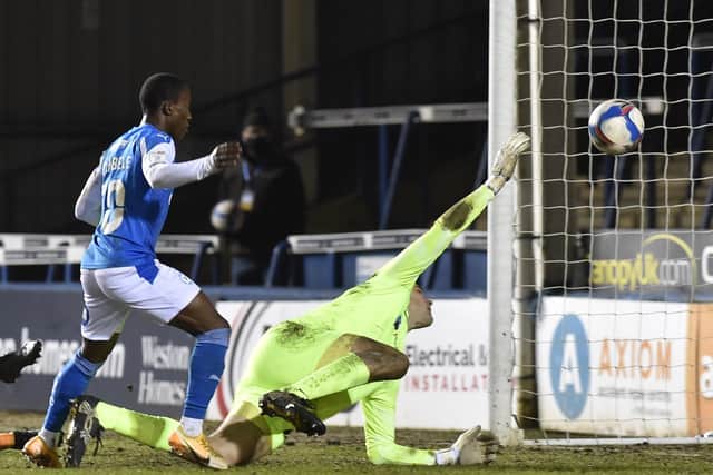 Siriki Dembele makes it Posh 4, Portsmouth 0. Photo: David Lowndes.